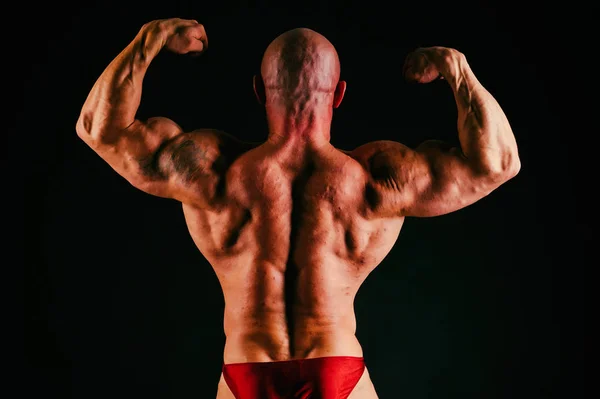 The body is muscular bodybuilder — Stock Photo, Image