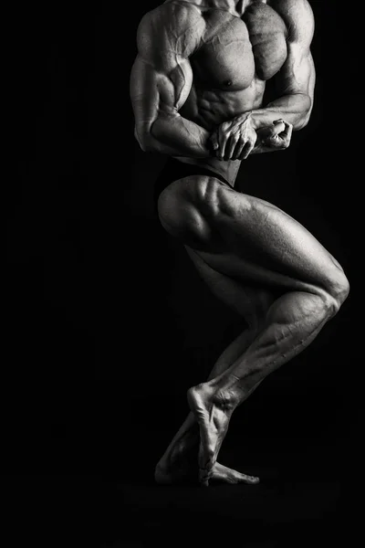 Bodybuilder  on a black background — Stock Photo, Image