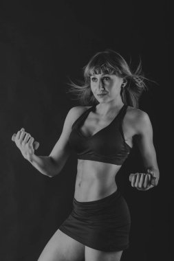 güzel spor şekil siyah bir zemin üzerine