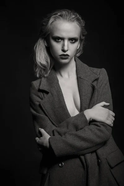 Sexy blond in a coat. fashion Photo — Stock Photo, Image