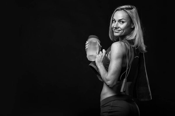 Female fitness on a black background