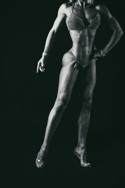 Vackra motion, muskulös kvinna — Stockfoto