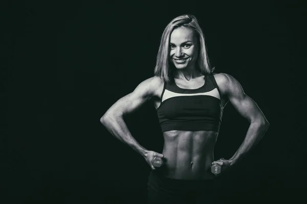 Fitness woman body on a black and white photo. — Stock Photo, Image