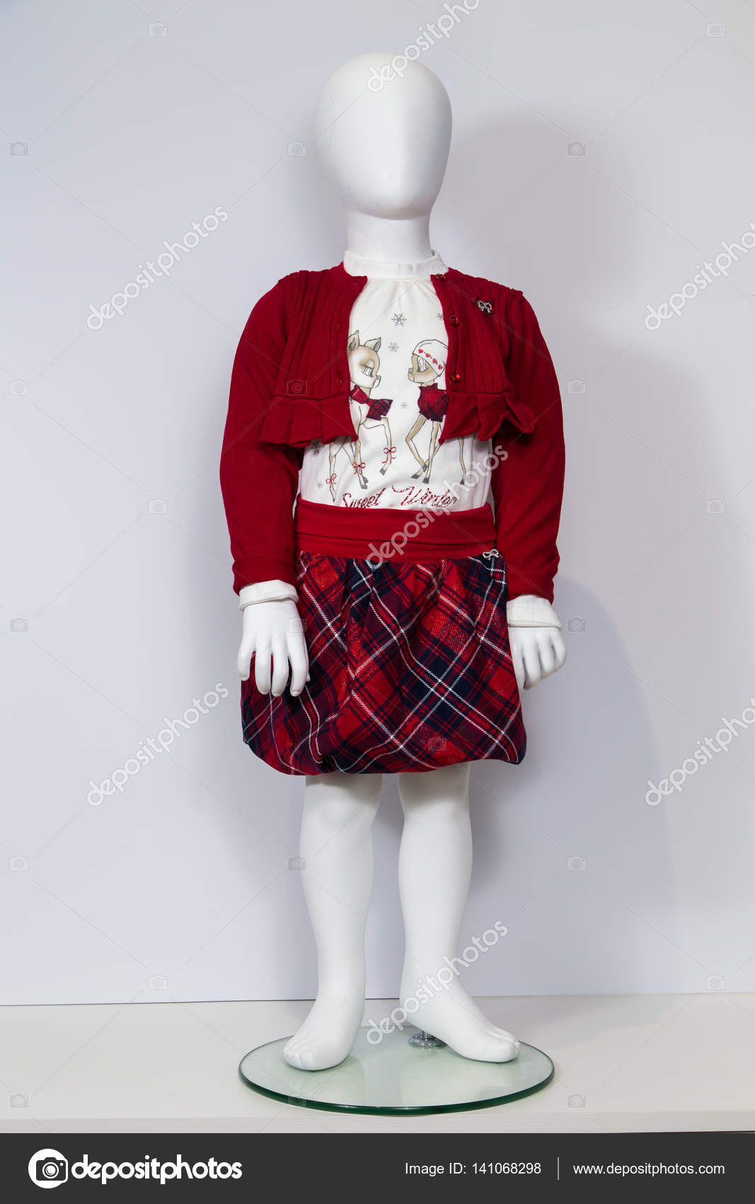 Mannequins with children's clothes Stock Photo by ©aallm 141068298