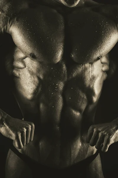 Bakgrunden på muskulös manliga kroppen — Stockfoto