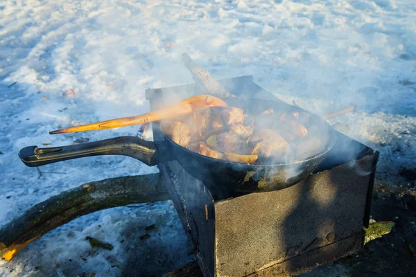 Preparing food on the grill in the winter — Stock Photo, Image