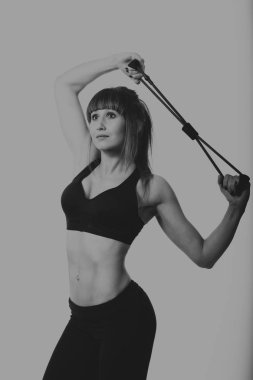 Kaslı kadın bedeni ter ile