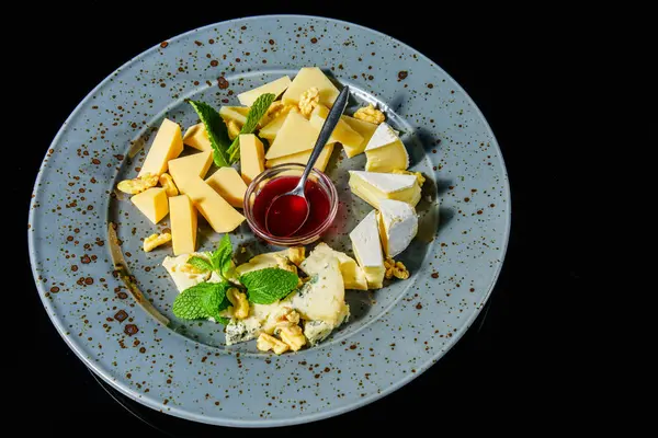 Cheese on a plate — Stock Photo, Image