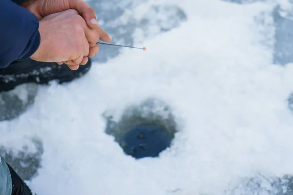 Winter fishing on river ice. — Stock Photo, Image