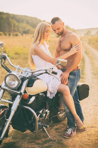 Loving couple at sunset — Stock Photo, Image