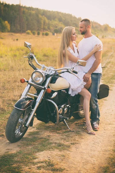 Loving couple at sunset — Stock Photo, Image