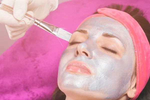 Woman takes a cosmetology procedure — Stock Photo, Image