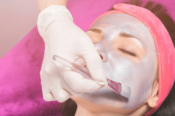 Woman takes a cosmetology procedure — Stock Photo, Image