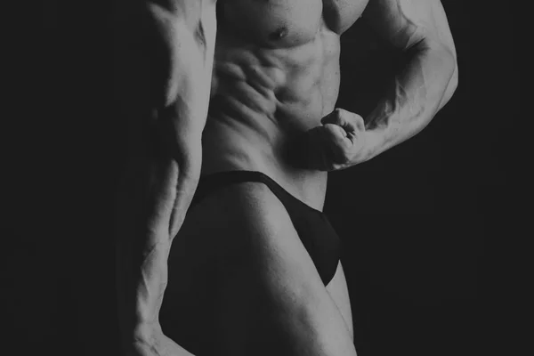 Male fitness concept on a dark background. — Stock Photo, Image