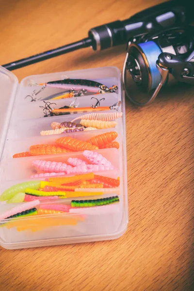 Equipment for fishing on a wooden background. — Stock Photo, Image