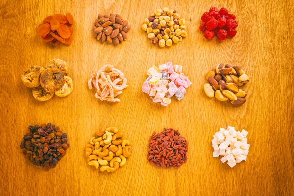 Handful of different dried fruits and nuts — Stock Photo, Image