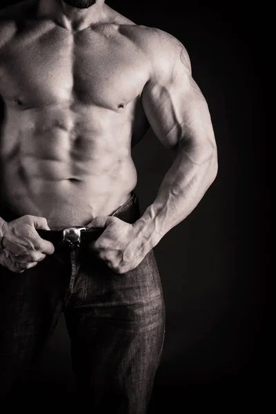 A beautiful man's pumped body. The concept of bodybuilding — Stock Photo, Image