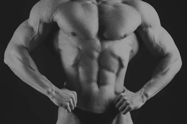 A beautiful man's pumped body. The concept of bodybuilding — Stock Photo, Image