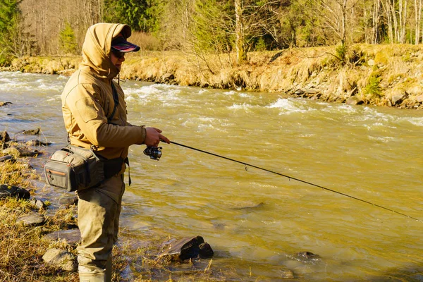 Trout fishing in the mountain river — Stock Photo, Image