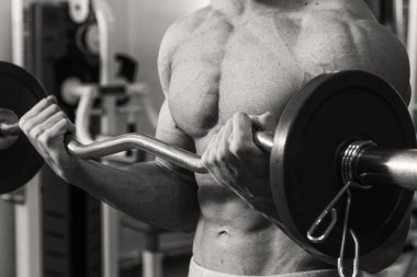 Kaslı, kabarık vücut geliştirmeci güzel fotoğraf