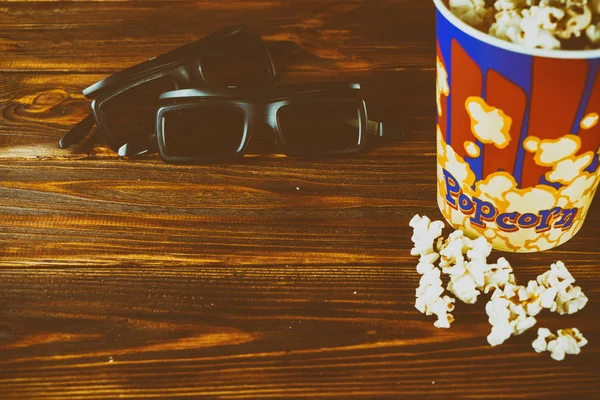 Popcorn Glasses Watching Movies Wooden Background Toned Photo — Stock Photo, Image