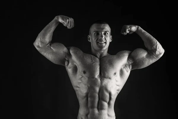 Muscular Man Bodybuilder Training Gym Posing Muscle — Stock Photo, Image