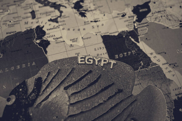Magnet from Egypt on the map travel background