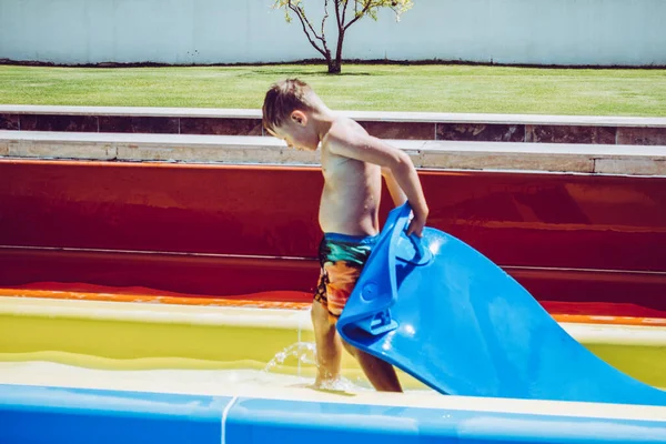 Boy Rides Slide Water Park — Stock Photo, Image