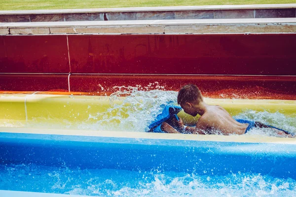 Boy Rides Slide Water Park — Stock Photo, Image