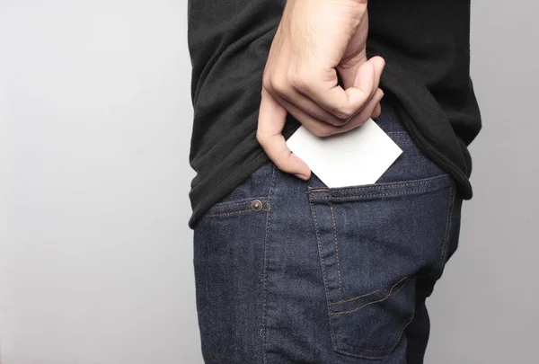 Pulling card on back pocket — Stock Photo, Image