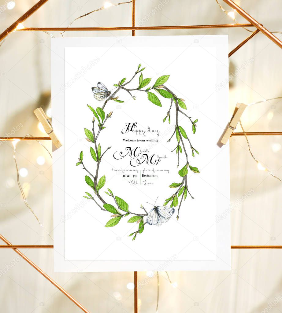 Template for congratulations or invitations to the wedding in green colors. Illustration by markers, beautiful frame wreath of butterflies and twigs with leaves.