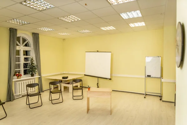 interior of a boardroom meeting room briefing room office with yellow walls