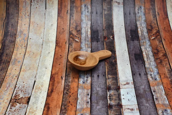 A small brown spoon made of wood — ストック写真