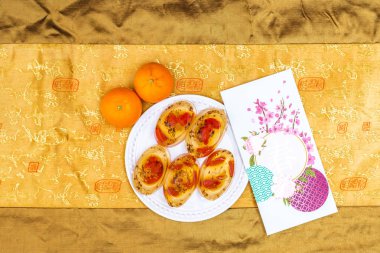 Kurtlu Osmanthus Jölesi. Ay Çin 'in yeni yıl atıştırmalıkları. Yemekten sonra tatlı serinletiyor. Kırmızı paketlerle kutlama.