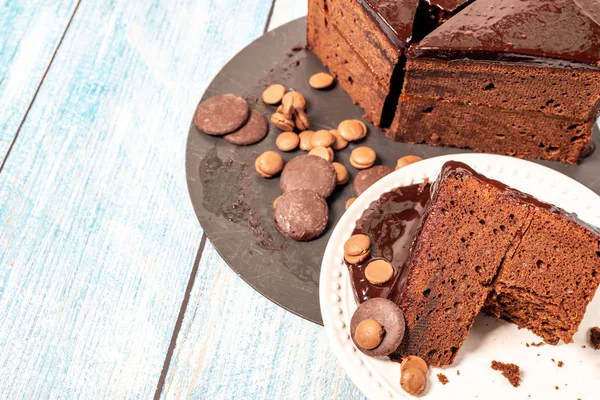 Sacher Cake, home-made. Typical Austrian chocolate cake, with a thin layer of apricot jam.