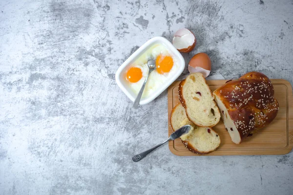 Breakfast brunch on table. Flat lay concept. Soft-boiled eggs, broken egg shells, food drink concept.