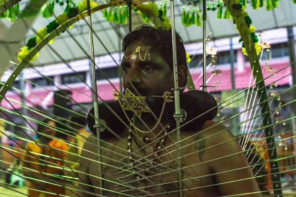 Asia/Singapore - Feb 8 2020 : Devotee carrying kavadi preparing for ceremony prayers blessings during Thaipusam festival. Hindu festival to worship God Muruga. — Stock Photo, Image