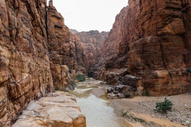 The entrance of Wadi Al Mujib reserve and canyon in Jordan in winter clipart