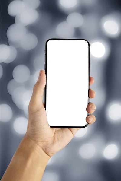 Gri bokeh arkaplanda akıllı telefon boş ekranı