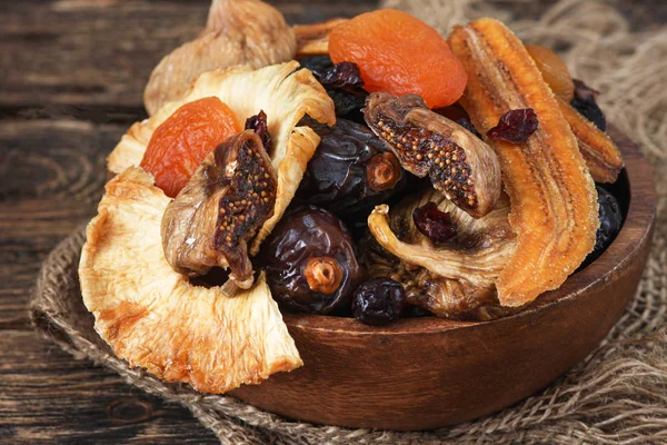 Mix from dried fruits in bowl. Healthy food. Symbols of judaic holiday Tu Bishvat