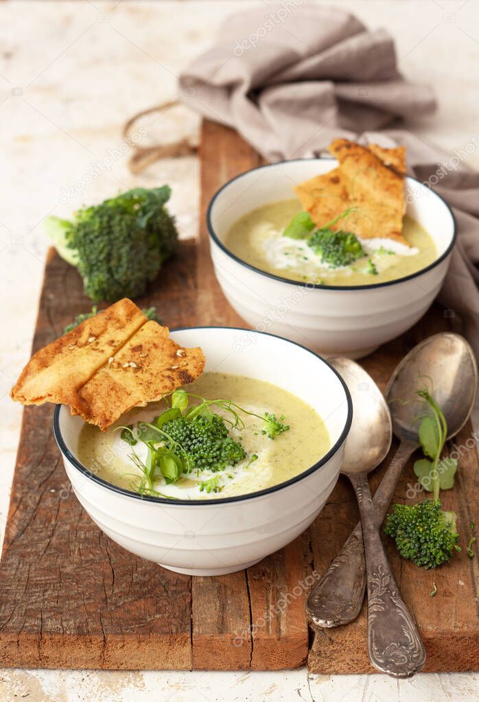 Spring  broccoli green cream soup. Vegan, vegetarian, healthy food concept.