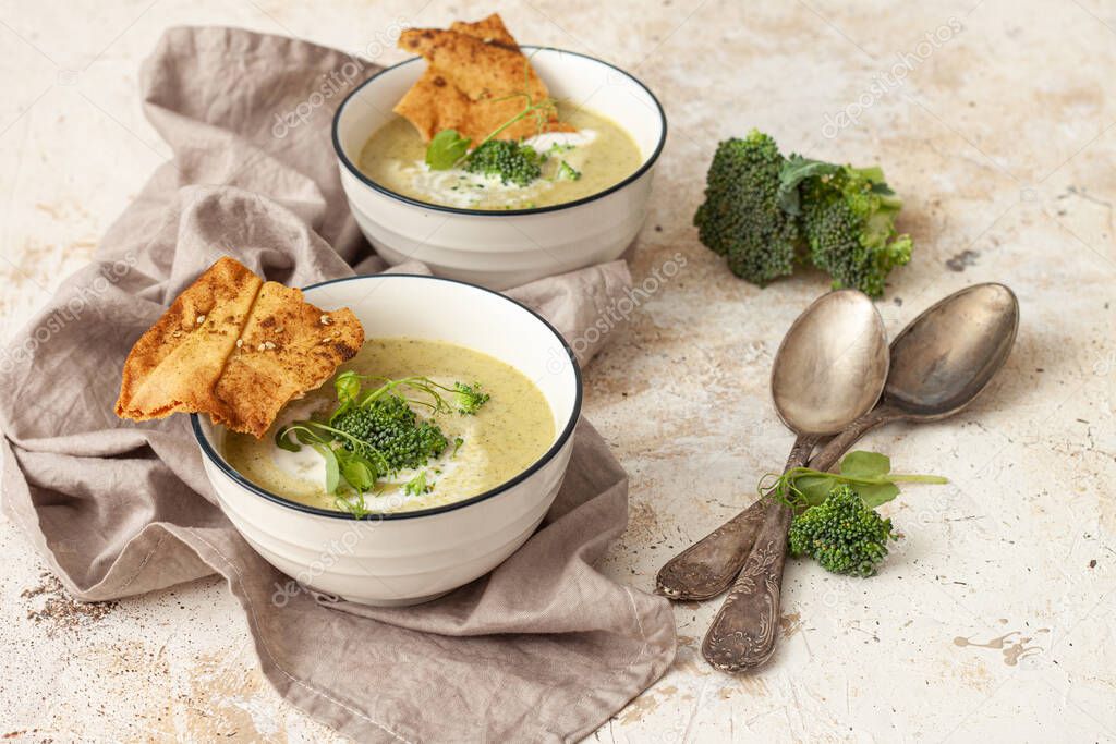 Spring  broccoli green cream soup. Vegan, vegetarian, healthy food concept.
