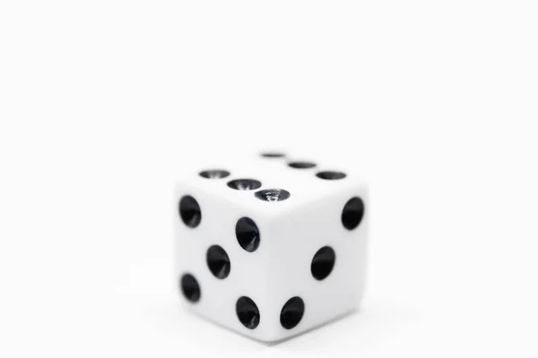 A plain white dice on white background in close up — Stock Photo, Image