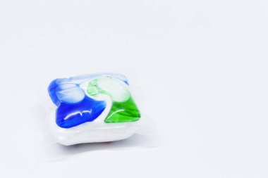 dishwasher tablet on white background