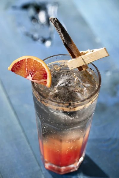 Fresh cocktail with fruit and ice. Alcoholic/ non-alcoholic drink beverage at the bar