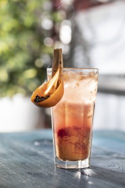 Fresh cocktail with fruit and ice. Alcoholic/ non-alcoholic drink beverage at the bar