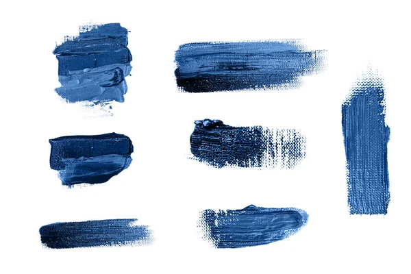 Conjunto de trazos azules sobre lienzo blanco —  Fotos de Stock