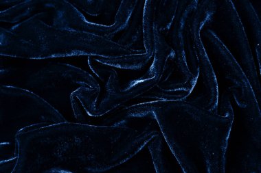 Kuru mavi kumaş yakın plan. Kadife desenli arka plan. 2020 'nin klasik mavi rengi.