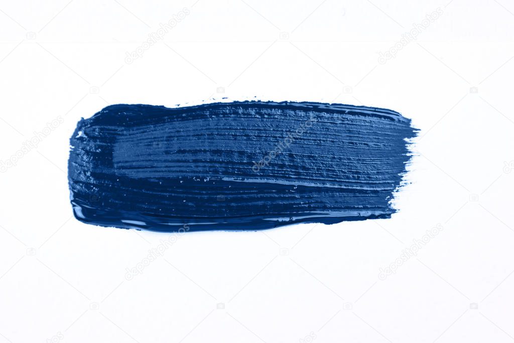 Blue stroke of the paint brush isolated on white.