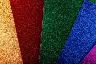 Renkli Noel dokusu. kırmızı altın mavisi, yeşil, pırıl pırıl, pembe, parıltılı, sevgililer günü arka planı.